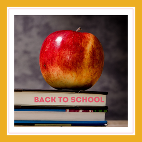 An apple on a short stack of books with a chalkboard in the background. Text, 
